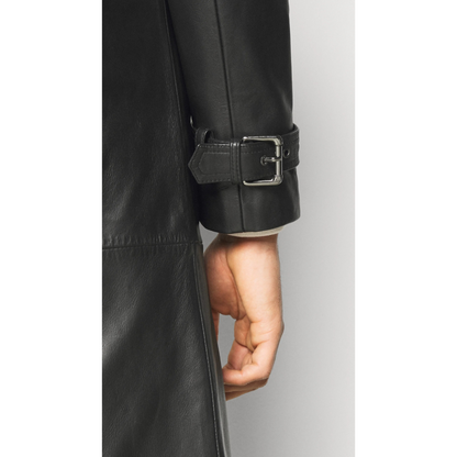 Close-up of cuff belt and stitching on men’s black full-grain leather trench coat sleeve, showcasing premium craftsmanship and buckle detailing by Hides & Cult.